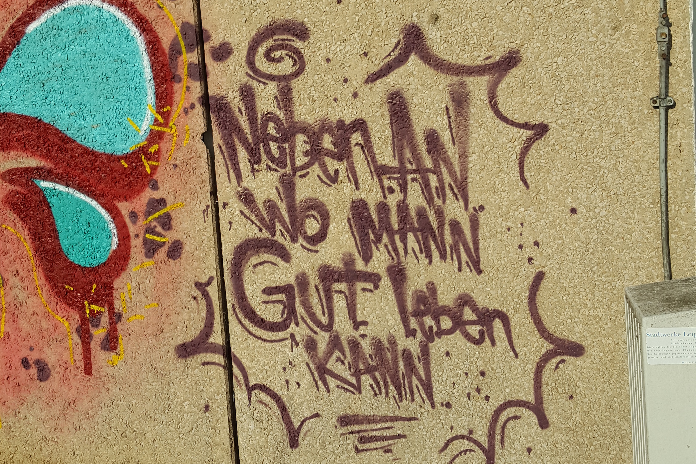 Graffiti an Wand.