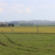 Landschaft mit Feldern und Wiesen.